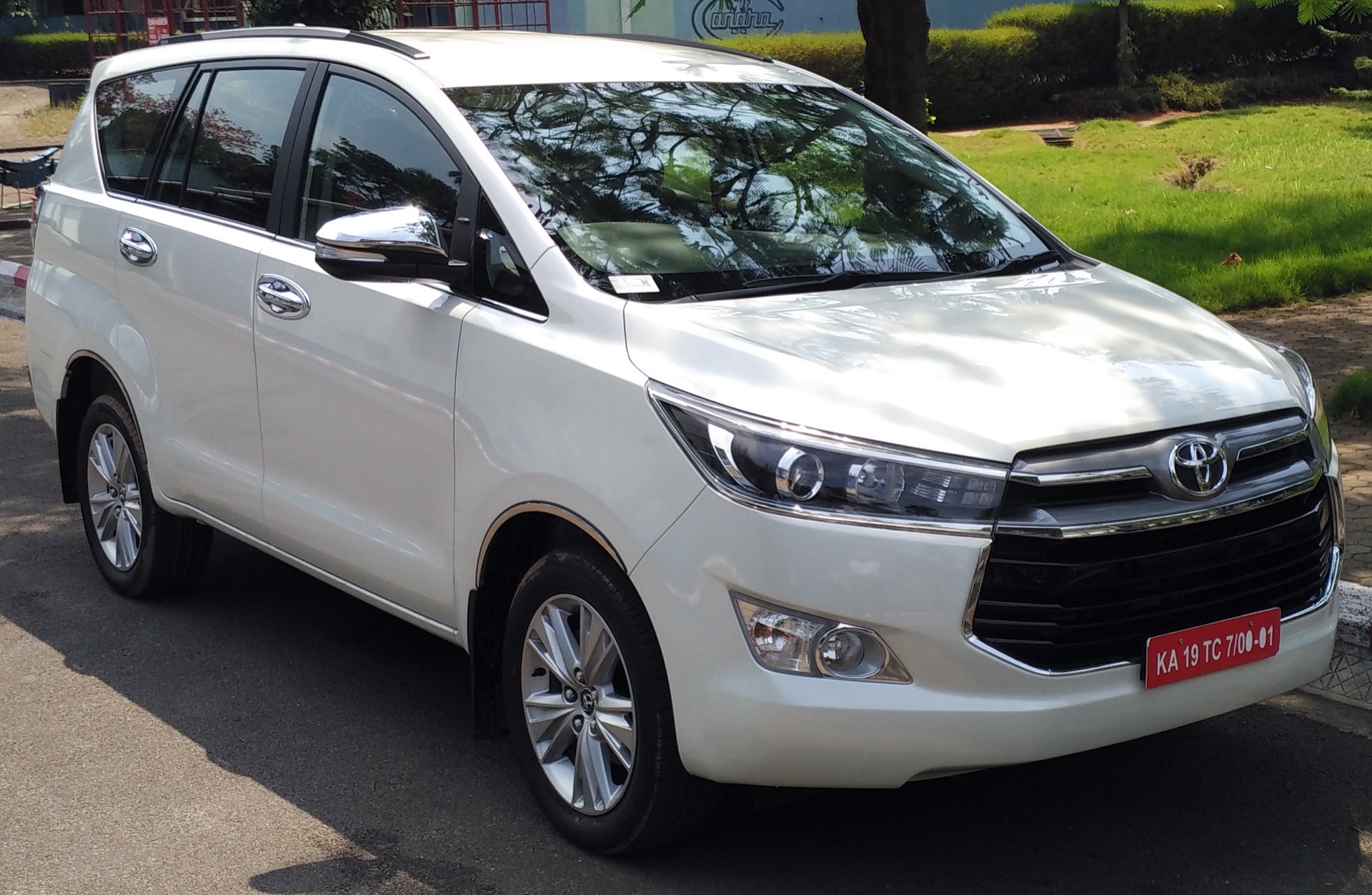 Royal Travels premium cab on the road in Udupi, Manipal